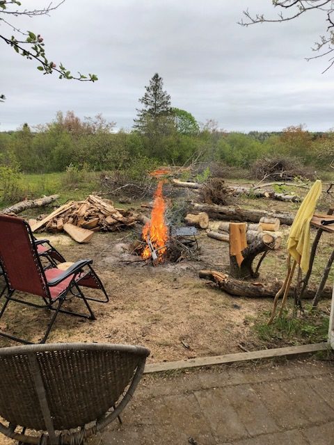 Large campfire with chairs